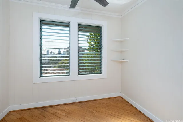 a view of a room that has a window in it