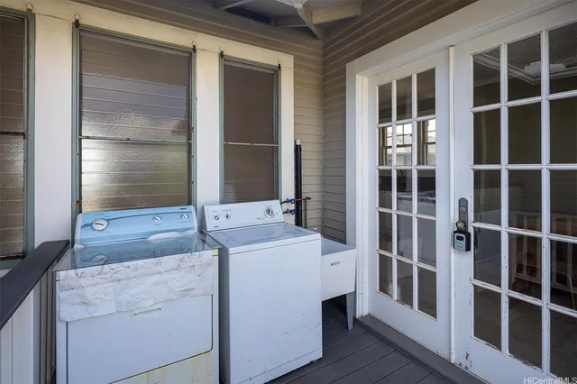 a utility room with dryer and washer