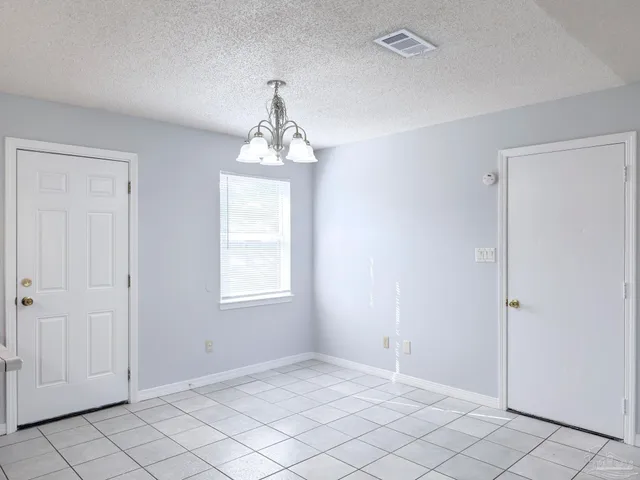 a view of an empty room with window