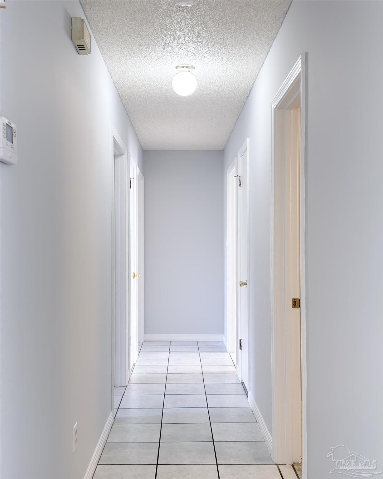 1341 Dog Track Road Pensacola, FL 32506 - Photo 9 of 26 a view of a hallway