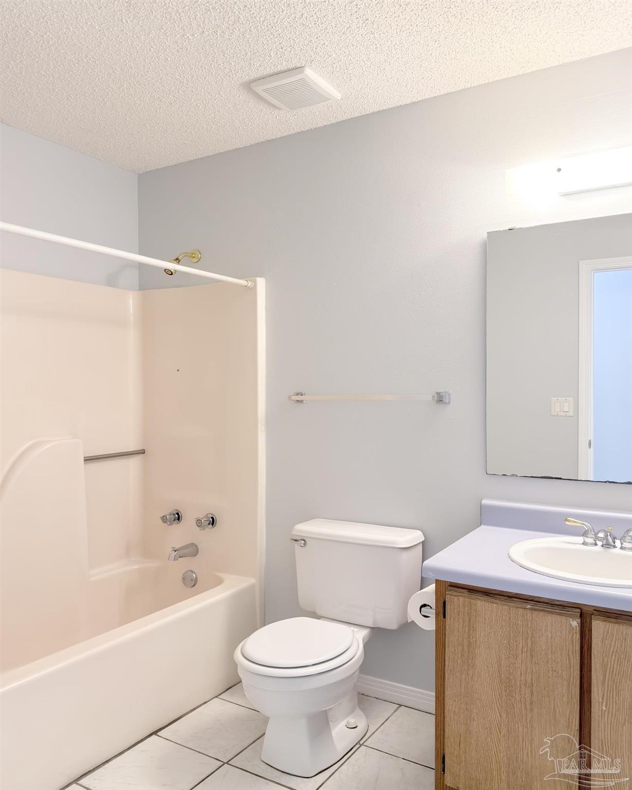 1341 Dog Track Road Pensacola, FL 32506 - Photo 10 of 26 a bathroom with a sink a toilet and shower