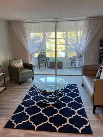 $110,000 | 9070 Lime Bay Boulevard, Unit 209, Tamarac, FL 33321