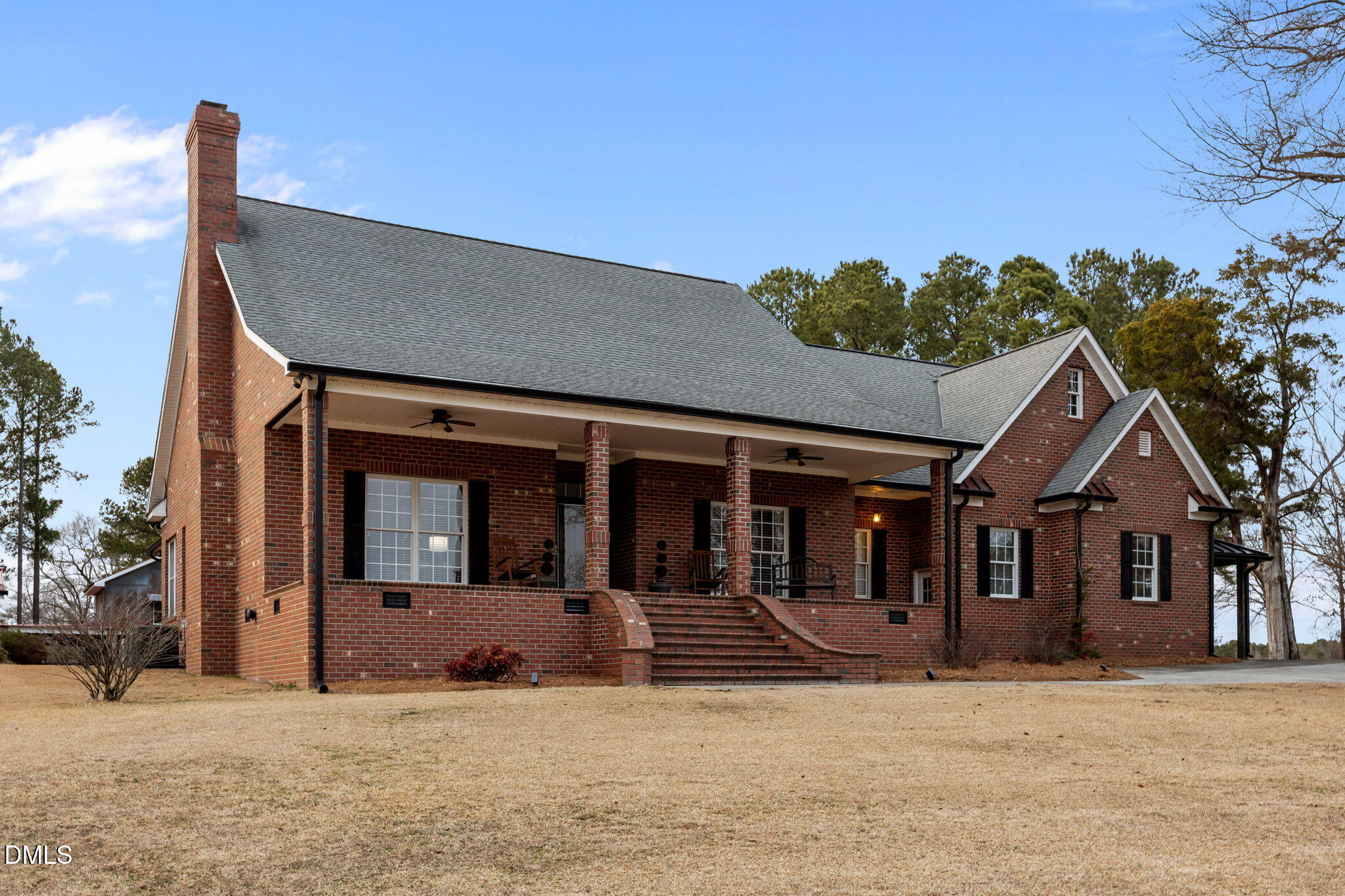 613 Will Lucas Road Linden, NC 28356 - Photo 11 of 98 a front view of a house with a garden