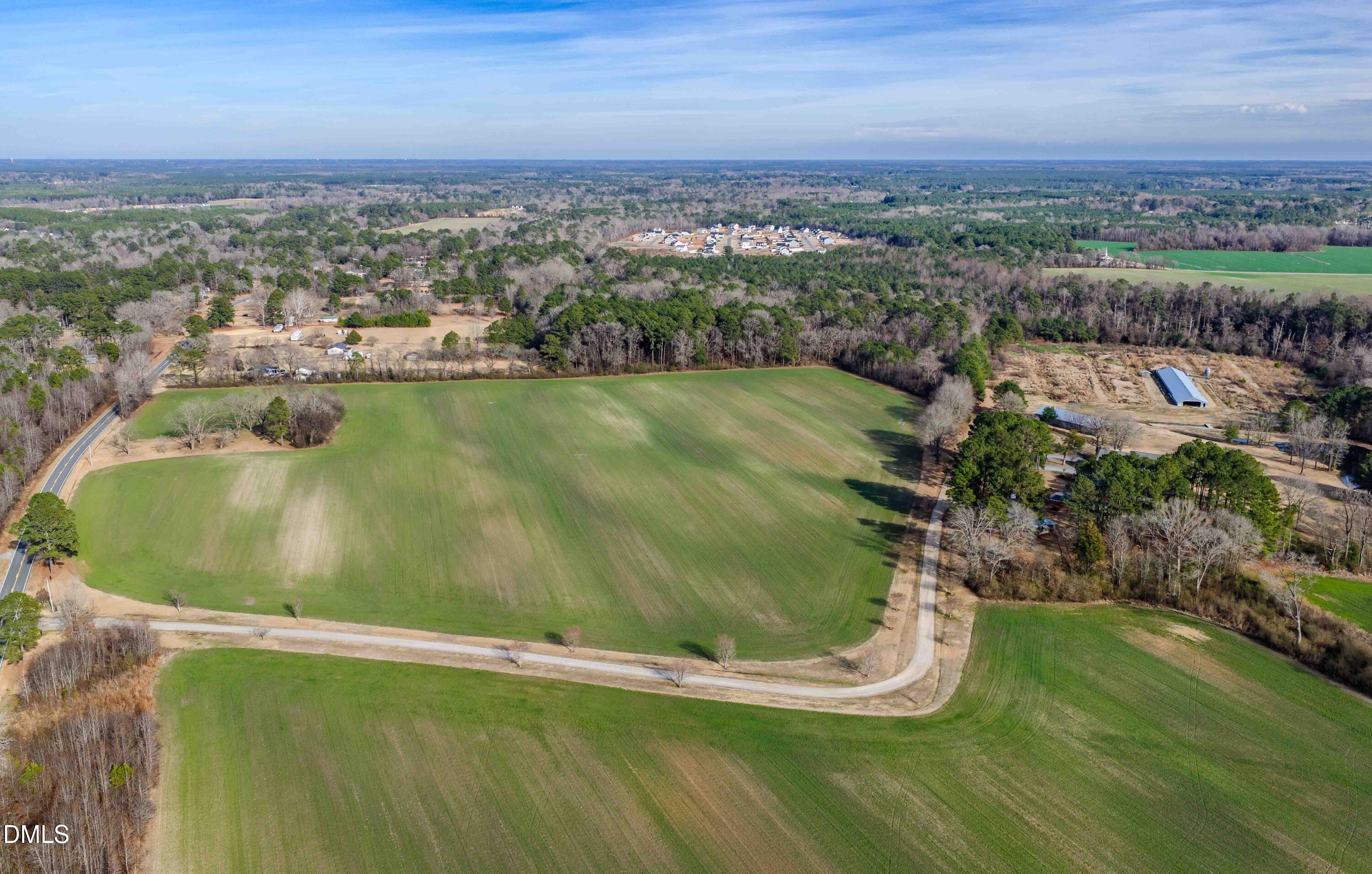613 Will Lucas Road Linden, NC 28356 - Photo 2 of 98 an aerial view of a house with a yard