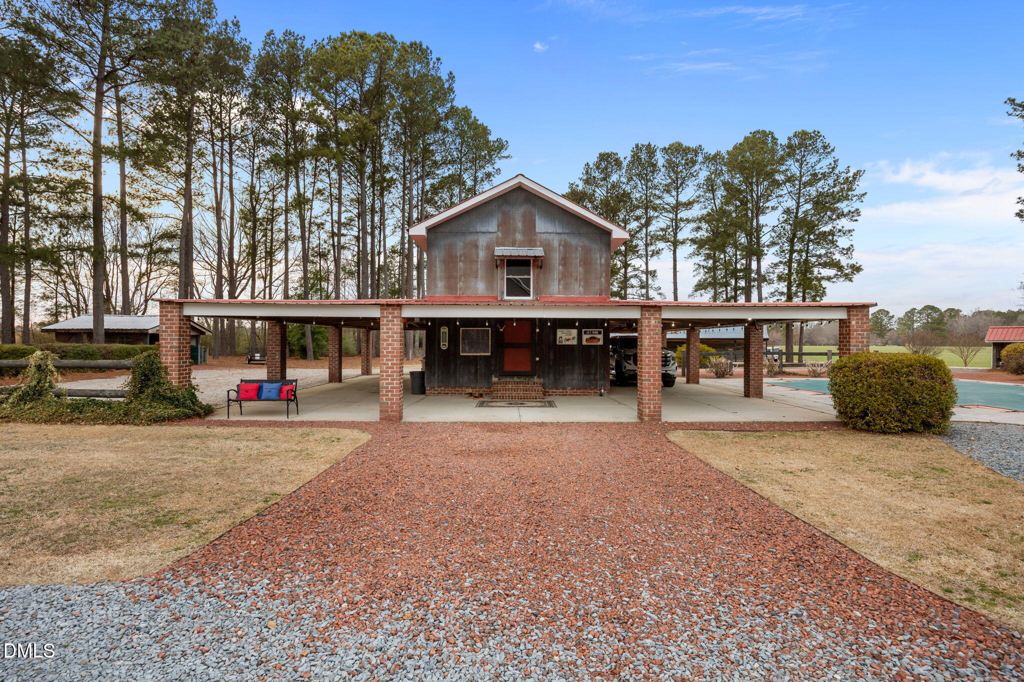 613 Will Lucas Road Linden, NC 28356 - Photo 25 of 98 a view of house with outdoor space and sitting area