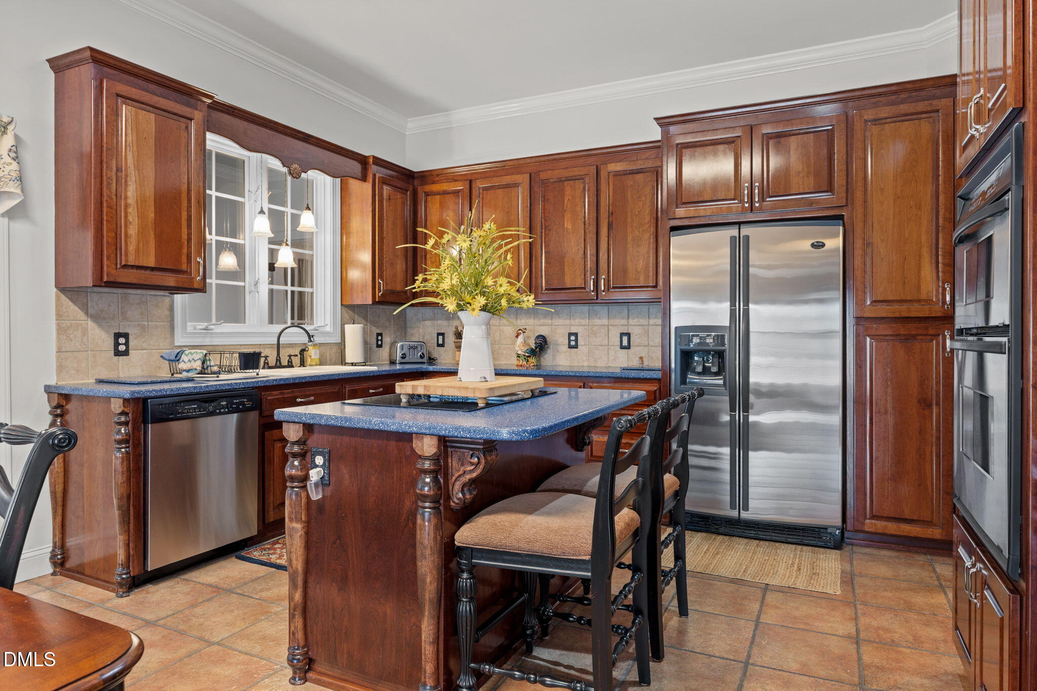 613 Will Lucas Road Linden, NC 28356 - Photo 35 of 98 a kitchen with stainless steel appliances granite countertop a refrigerator a sink a stove and a dining table