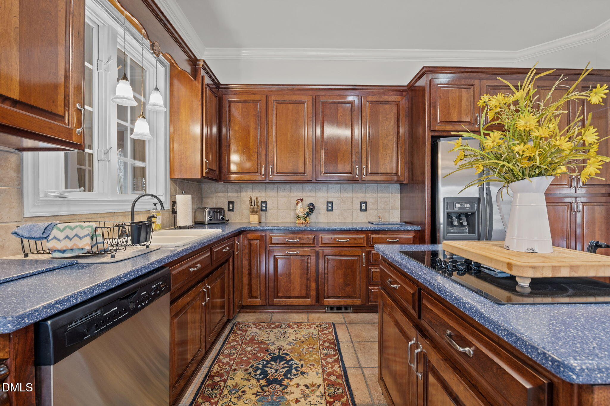613 Will Lucas Road Linden, NC 28356 - Photo 47 of 98 a kitchen with stainless steel appliances granite countertop a sink stove and cabinets