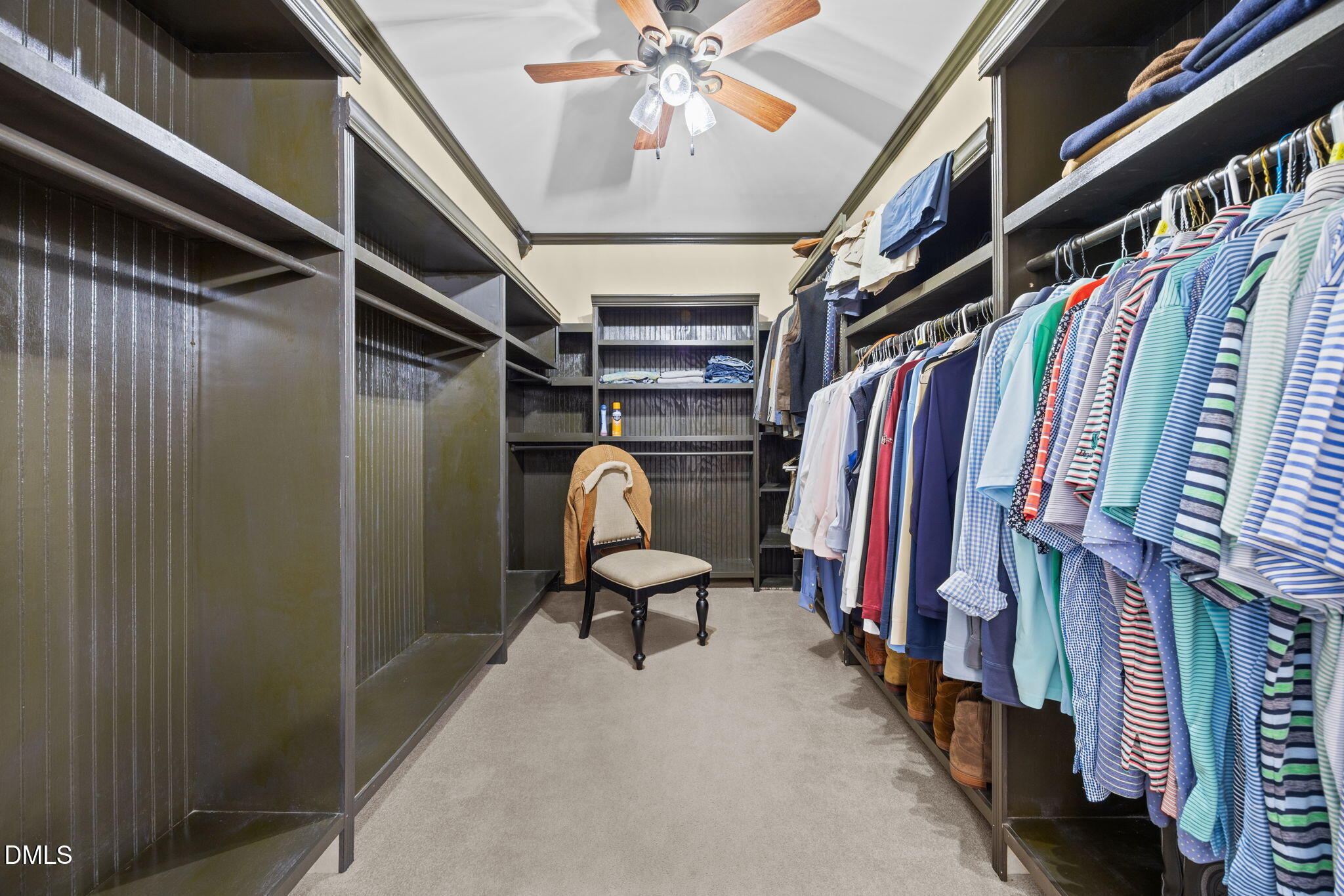 613 Will Lucas Road Linden, NC 28356 - Photo 52 of 98 a view of walk in closet with clothes and shoes