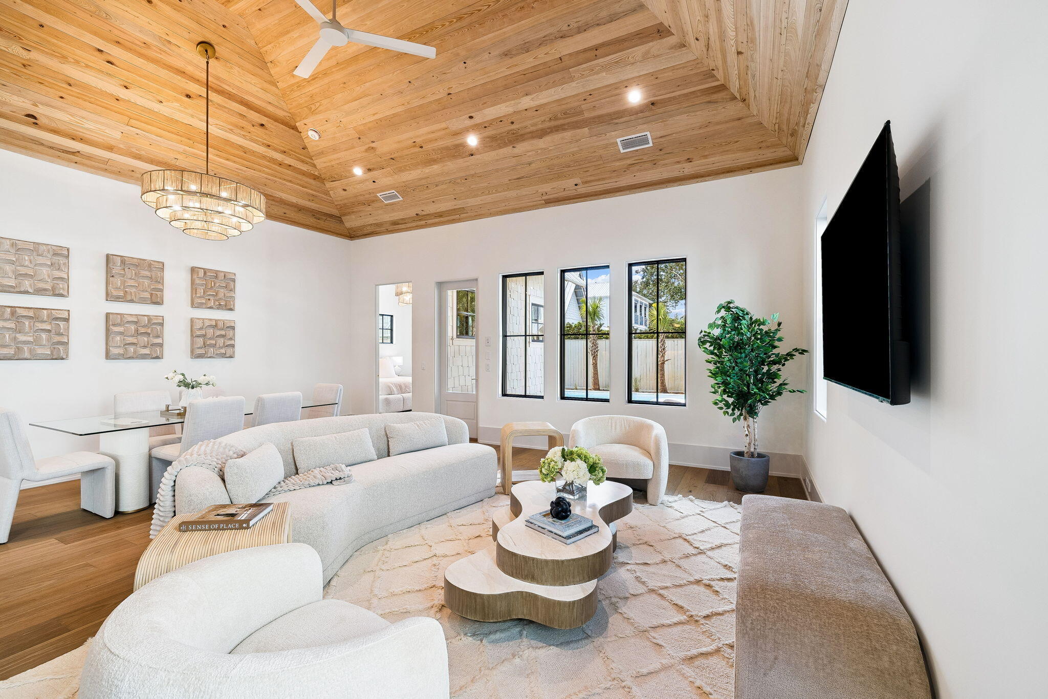 15 Pine Cone Trail Inlet Beach Inlet Beach, FL 32461 - Photo 5 of 52 a living room with furniture a flat screen tv and a chandelier