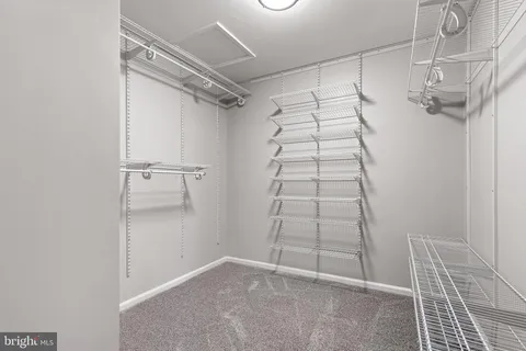 a bathroom with a double vanity sink and mirror