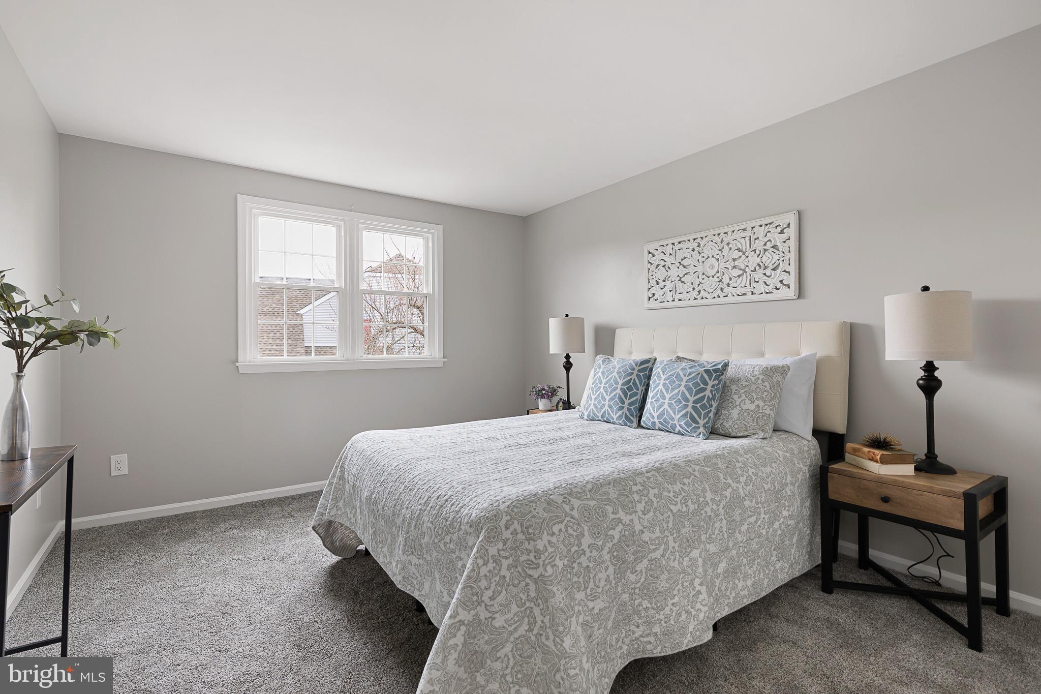 719 Jacques Circle Chester Springs, PA 19425 - Photo 22 of 31 a bedroom with a bed and window