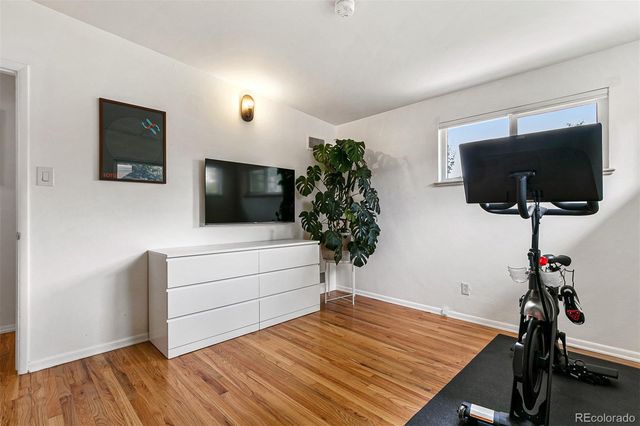 a room with furniture and a flat screen tv