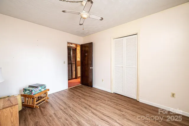 a view of livingroom with furniture and wooden floor