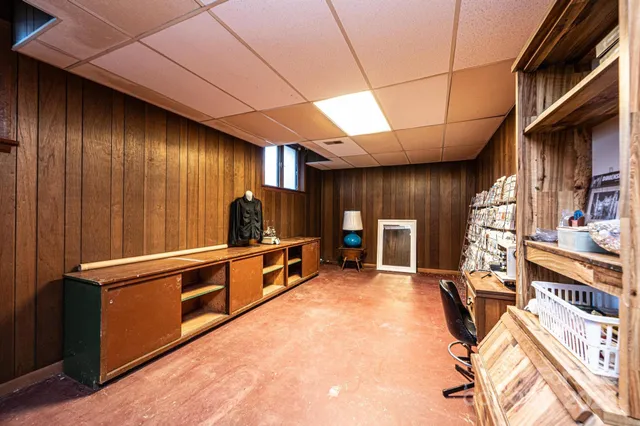 a view of an empty room with windows