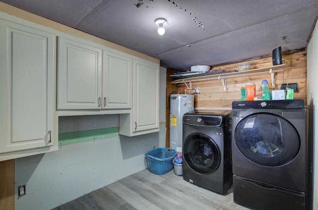 11291 Goss Street Wills Point, TX 75169 - Photo 18 of 23 a view of washer and dryer in a utility room