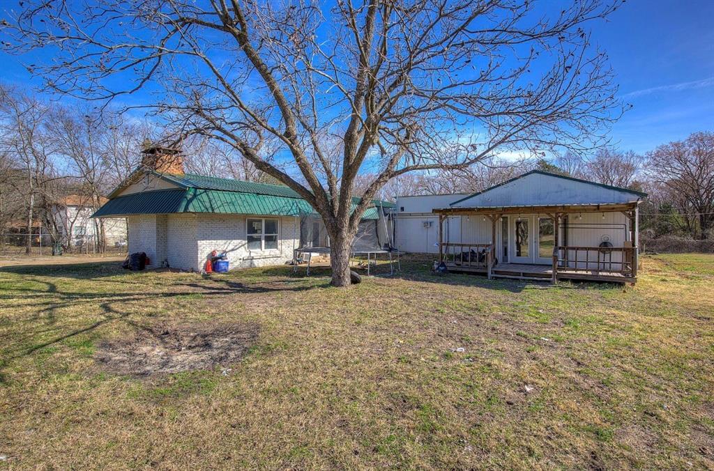 11291 Goss Street Wills Point, TX 75169 - Photo 23 of 23 a front view of a house with garden