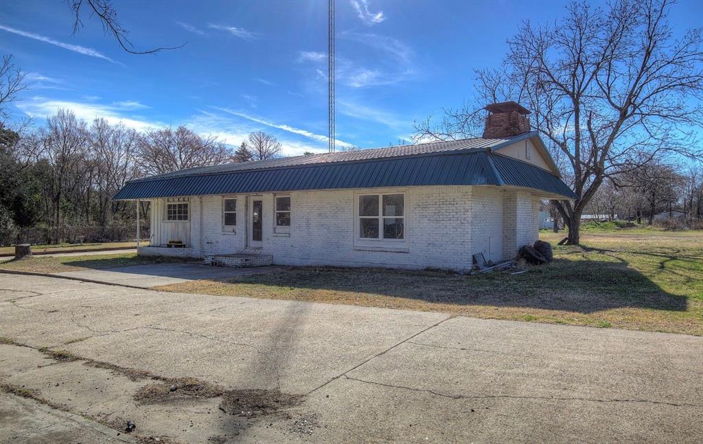 11291 Goss Street Wills Point, TX 75169 - Photo 6 of 23 a view of a house with backyard and trees