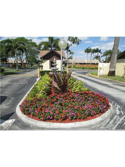 745 Banks Road, Unit 745 Margate, FL 33063 - Photo 12 of 13 a view of a street with a houses