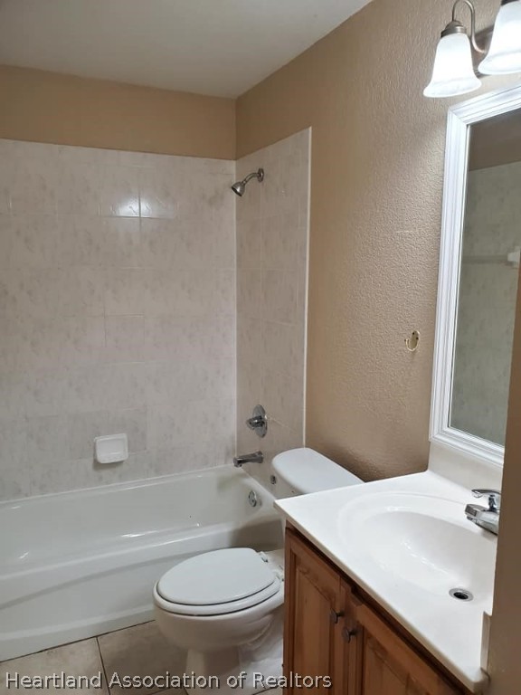 1812 Wightman Avenue Sebring, FL 33870 - Photo 11 of 22 a bathroom with a sink toilet vanity and shower