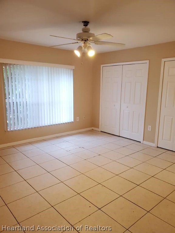 1812 Wightman Avenue Sebring, FL 33870 - Photo 13 of 22 a view of an empty room and a window
