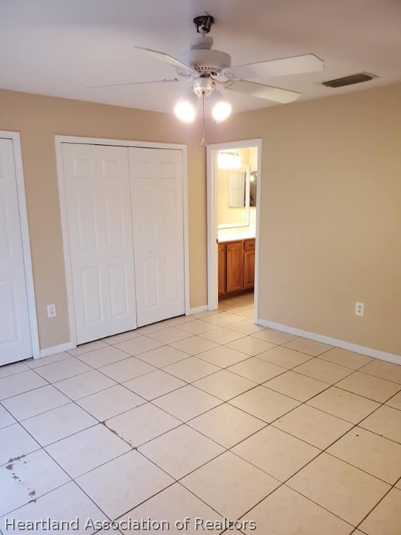 1812 Wightman Avenue Sebring, FL 33870 - Photo 17 of 22 a view of an empty room and a bathroom