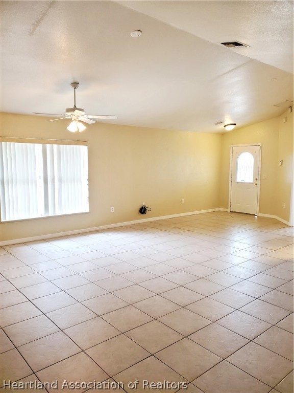 1812 Wightman Avenue Sebring, FL 33870 - Photo 19 of 22 a view of an empty room and window