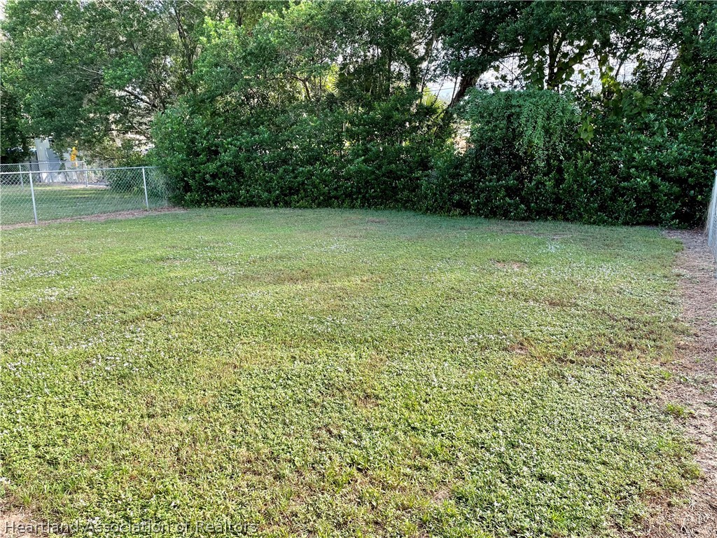 1812 Wightman Avenue Sebring, FL 33870 - Photo 21 of 22 a view of a garden
