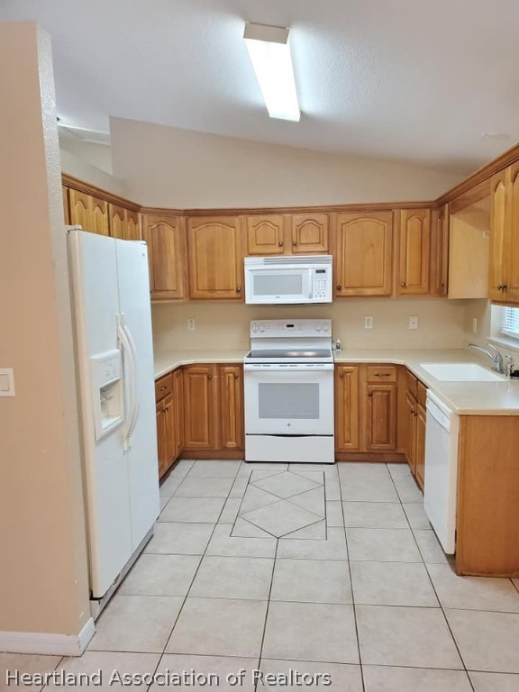 1812 Wightman Avenue Sebring, FL 33870 - Photo 5 of 22 a kitchen with a cabinets and a counter top space