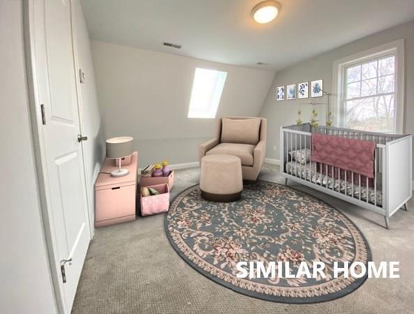 2 Braemore Road Billerica, MA 01821 - Photo 3 of 6 a living room with furniture and a table