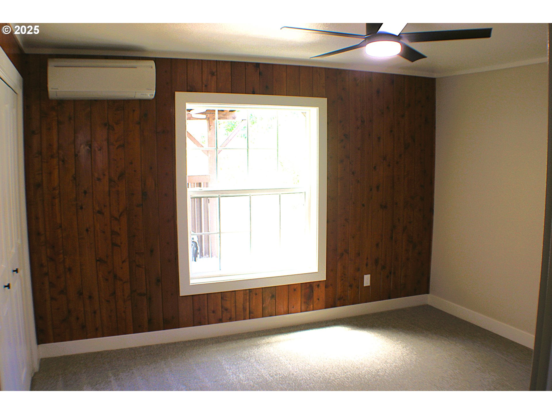 3450 Shoestring Road Riddle, OR 97469 - Photo 12 of 48 a view of an empty room with a window
