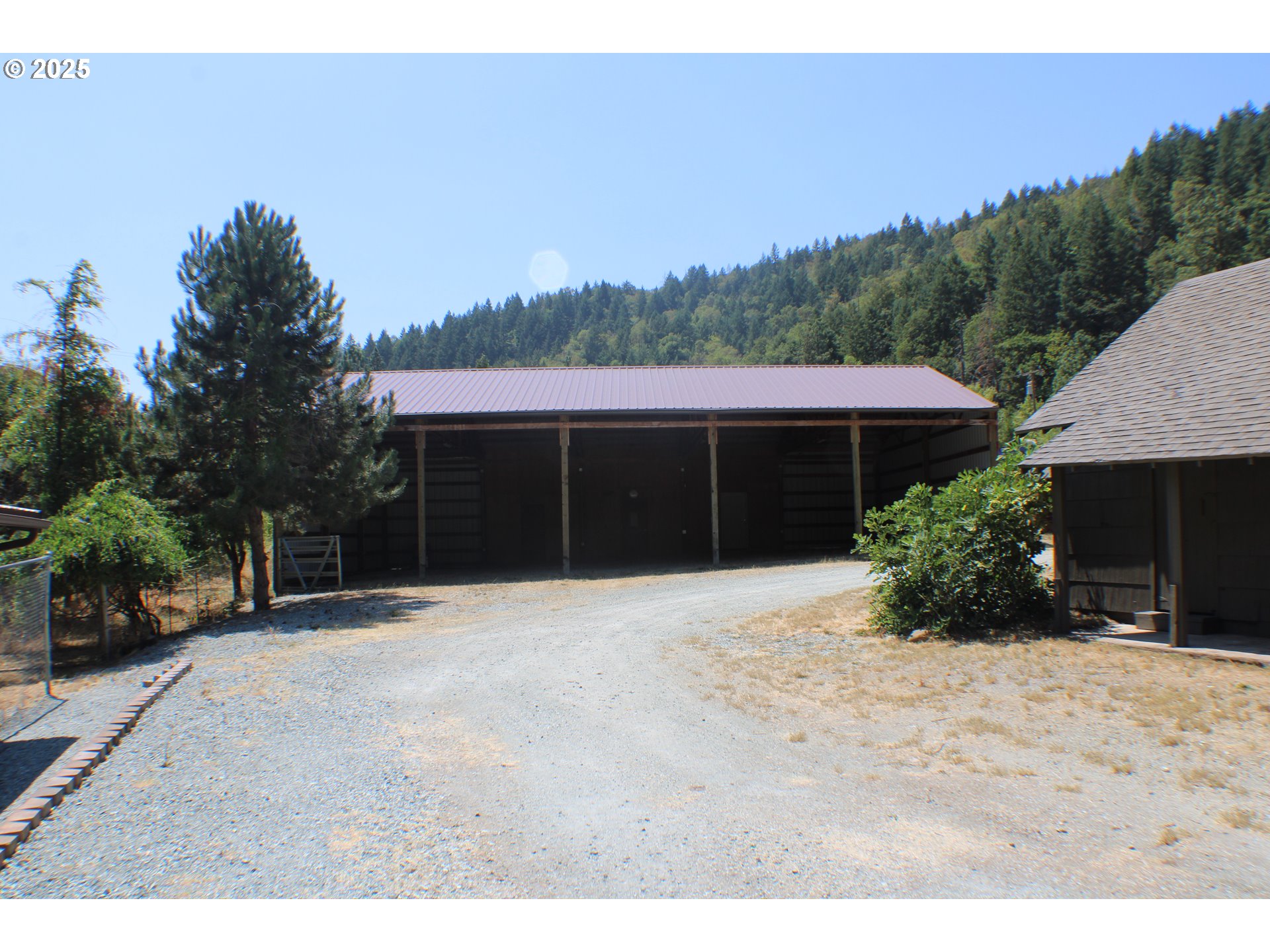 3450 Shoestring Road Riddle, OR 97469 - Photo 31 of 48 a front view of a house with a yard