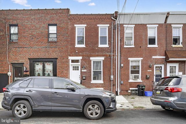 a car parked in front of a building