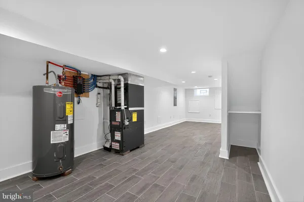 a view of a room with wooden floor and closet