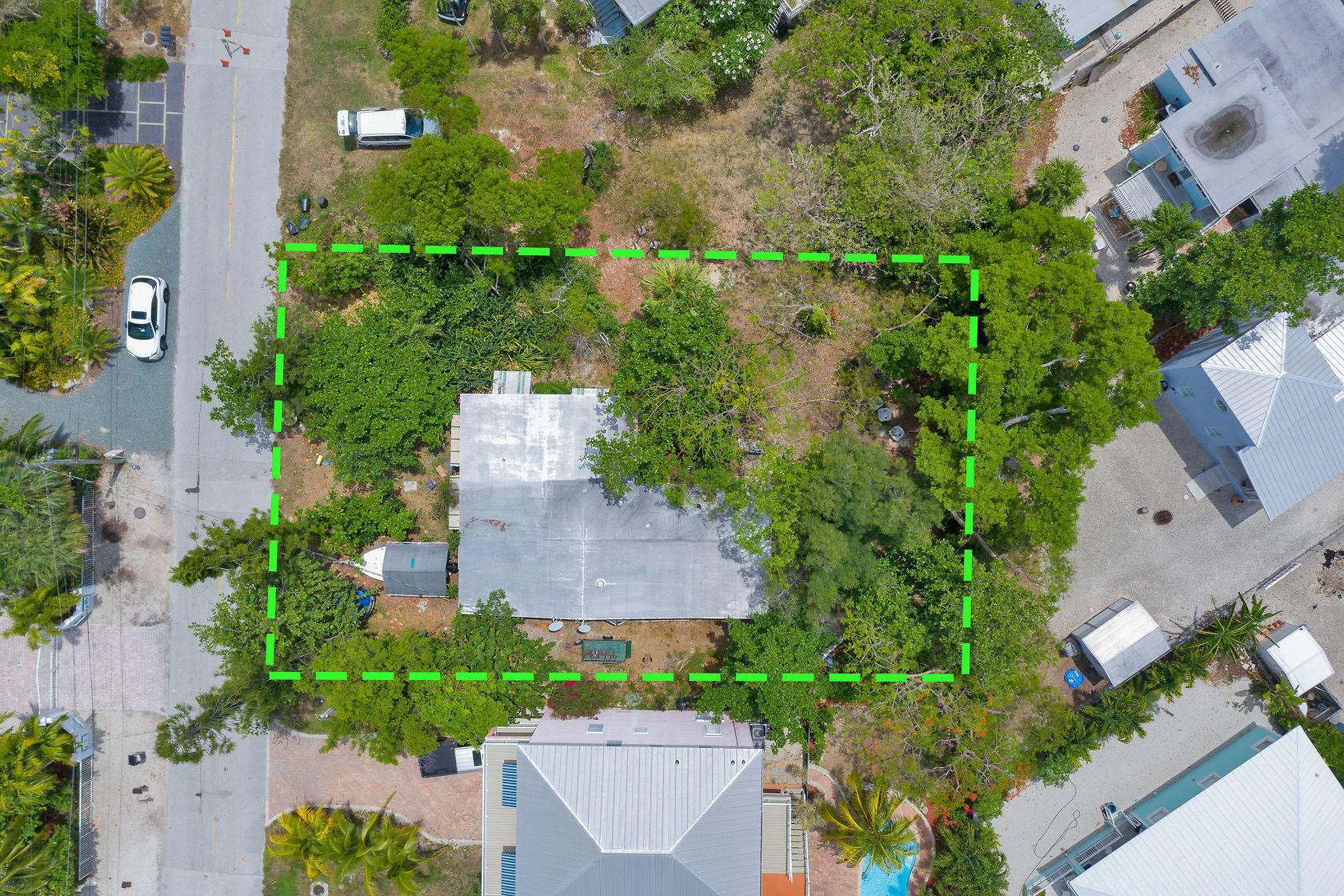 353 Sound Drive Key Largo, FL 33037 - Photo 2 of 28 an aerial view of a house with a yard and lake view