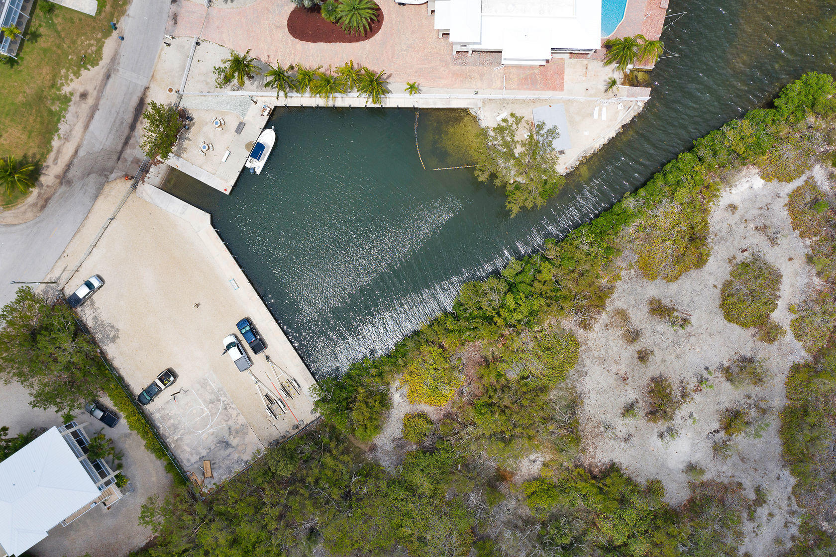 353 Sound Drive Key Largo, FL 33037 - Photo 19 of 28 an aerial view of a house with a yard