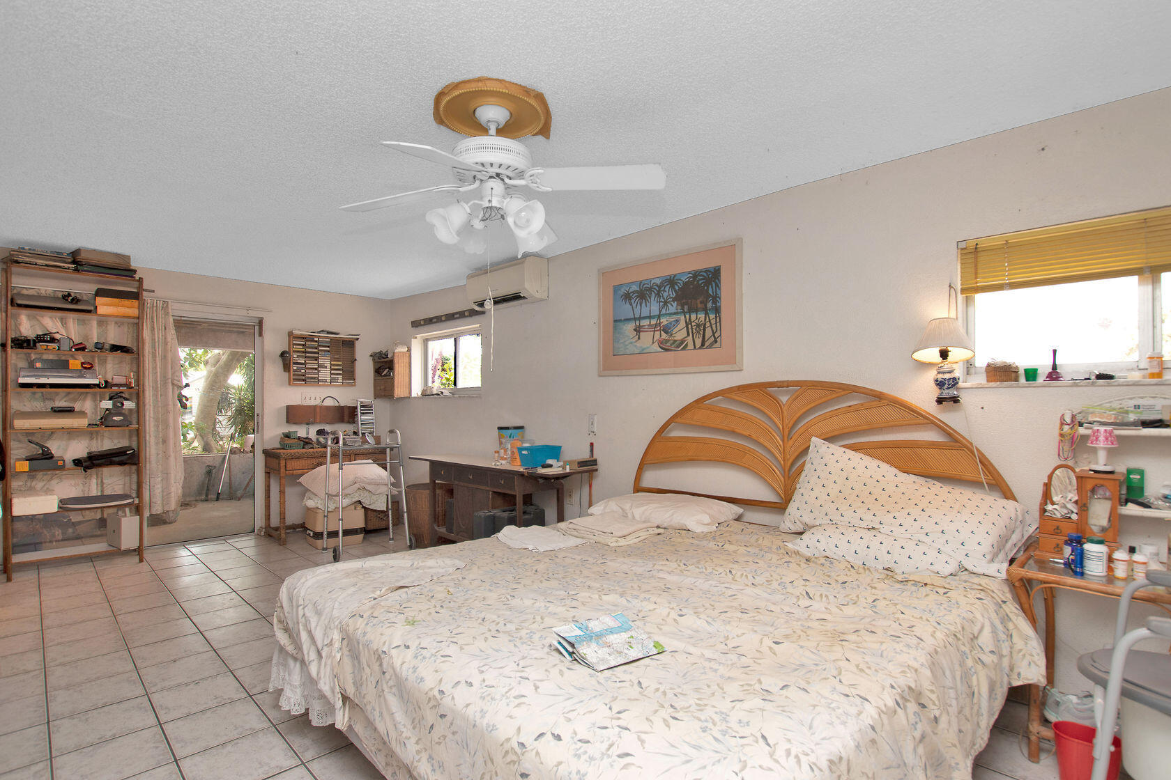 353 Sound Drive Key Largo, FL 33037 - Photo 21 of 28 a bedroom with bed and window