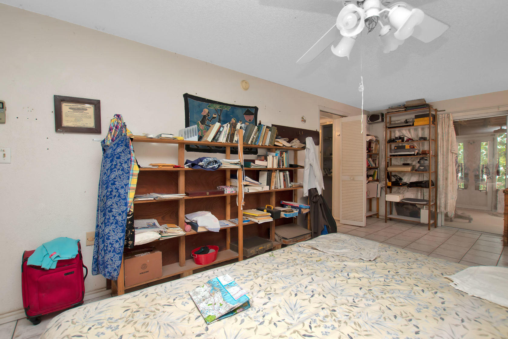 353 Sound Drive Key Largo, FL 33037 - Photo 22 of 28 a view of a bedroom with furniture and closet