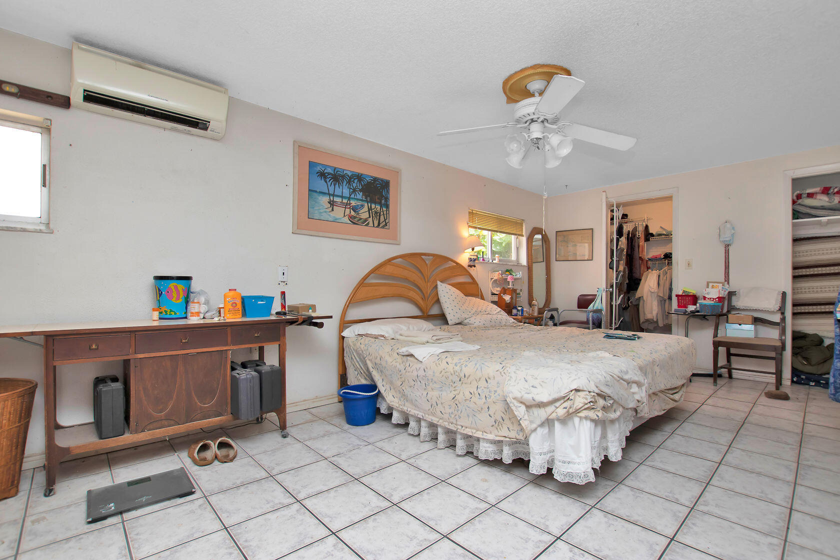 353 Sound Drive Key Largo, FL 33037 - Photo 26 of 28 a bed room with a bed and dresser