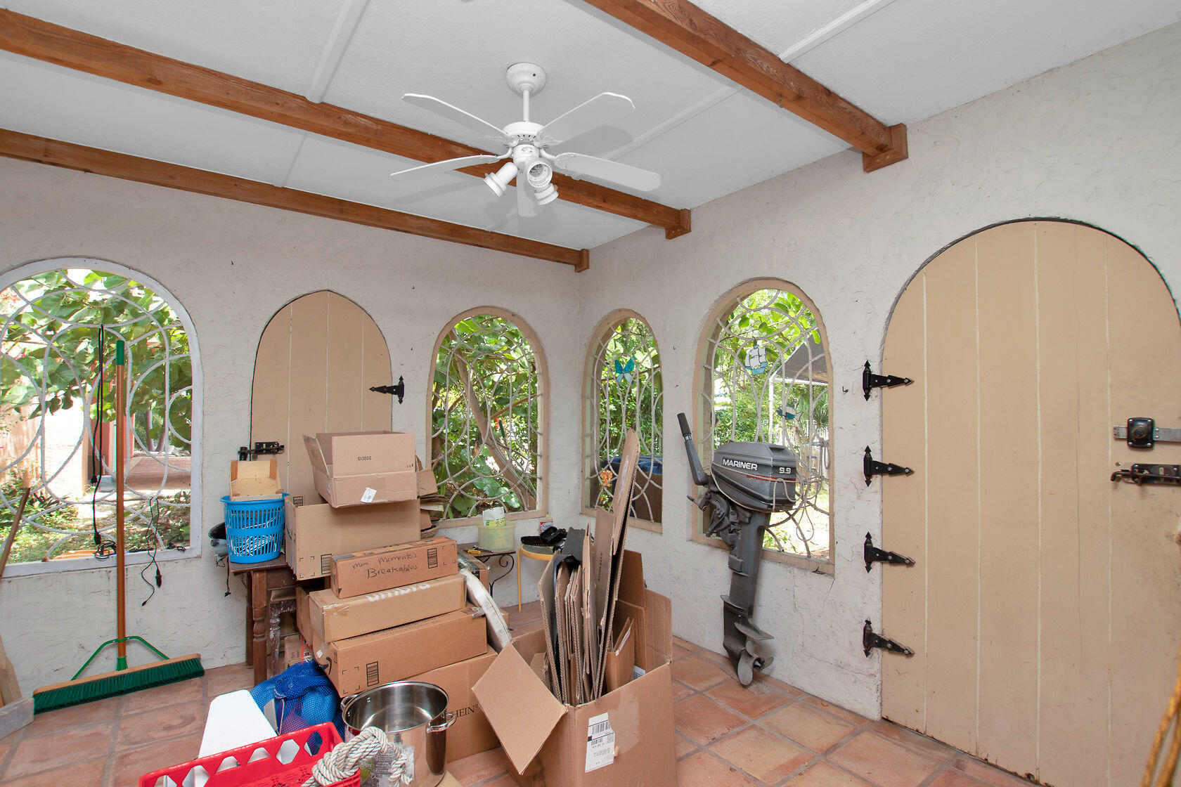 353 Sound Drive Key Largo, FL 33037 - Photo 27 of 28 a living room with fireplace furniture and a chandelier