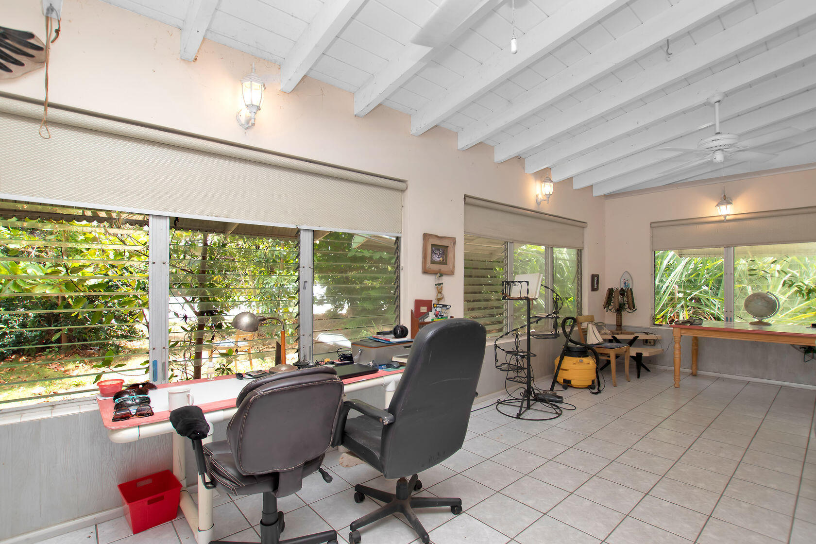 353 Sound Drive Key Largo, FL 33037 - Photo 4 of 28 a view of a dining room with furniture window and outside view