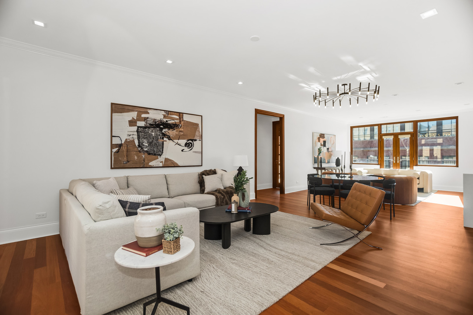 1152 West Fulton Market, Unit 4A Chicago, IL 60607 - Photo 3 of 19 a living room with furniture and wooden floor