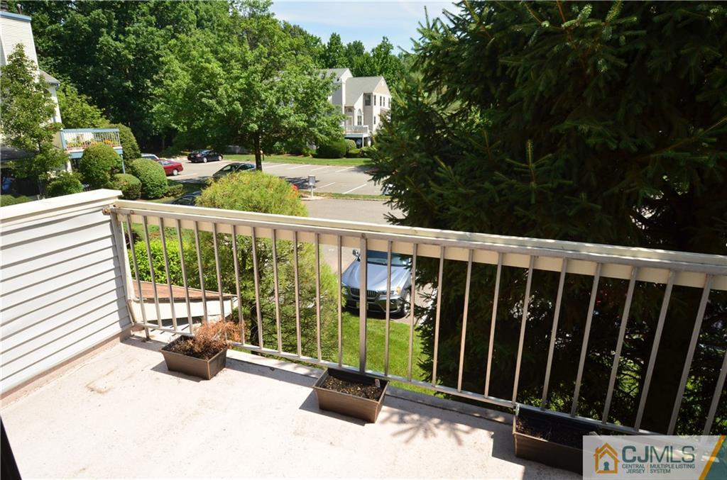 5206 Stonehedge Road Edison, NJ 08820 - Photo 12 of 13 a view of balcony with a potted plant