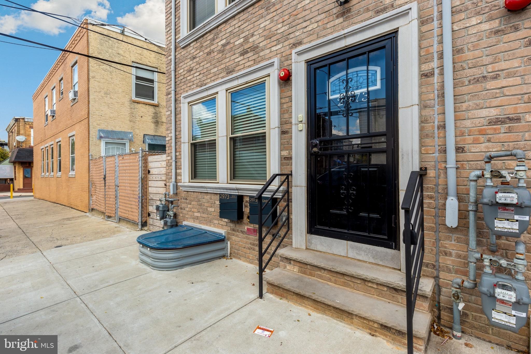 2973 Amber Street, Unit 2 Philadelphia, PA 19134 - Photo 1 of 1 a view of house with patio