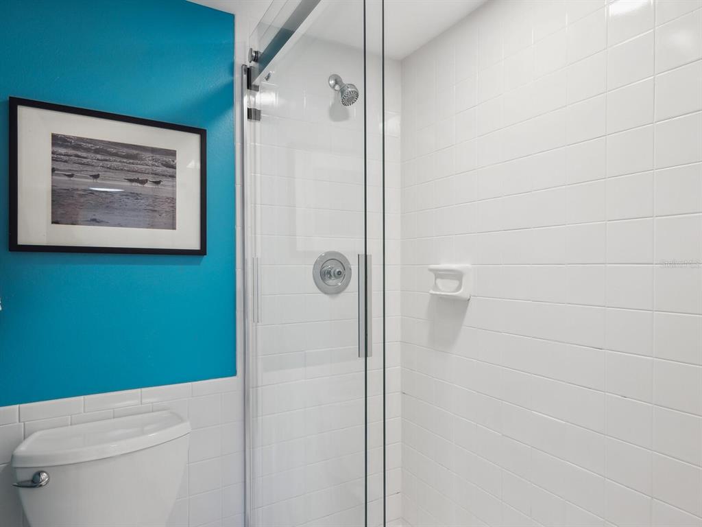 6157 Midnight Pass Road, Unit E12 Sarasota, FL 34242 - Photo 13 of 54