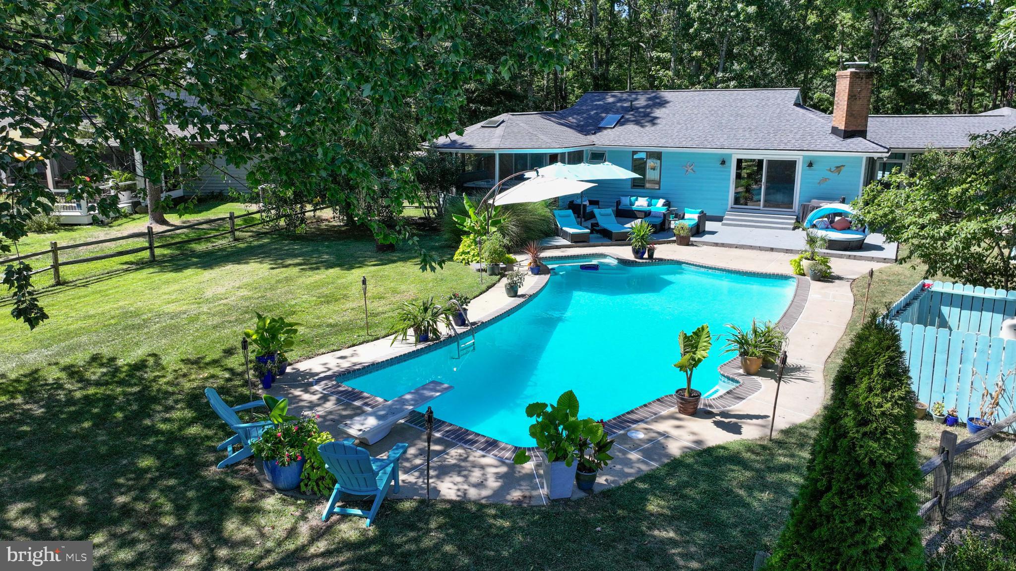 Gorgeous home with a pool and golf course view.