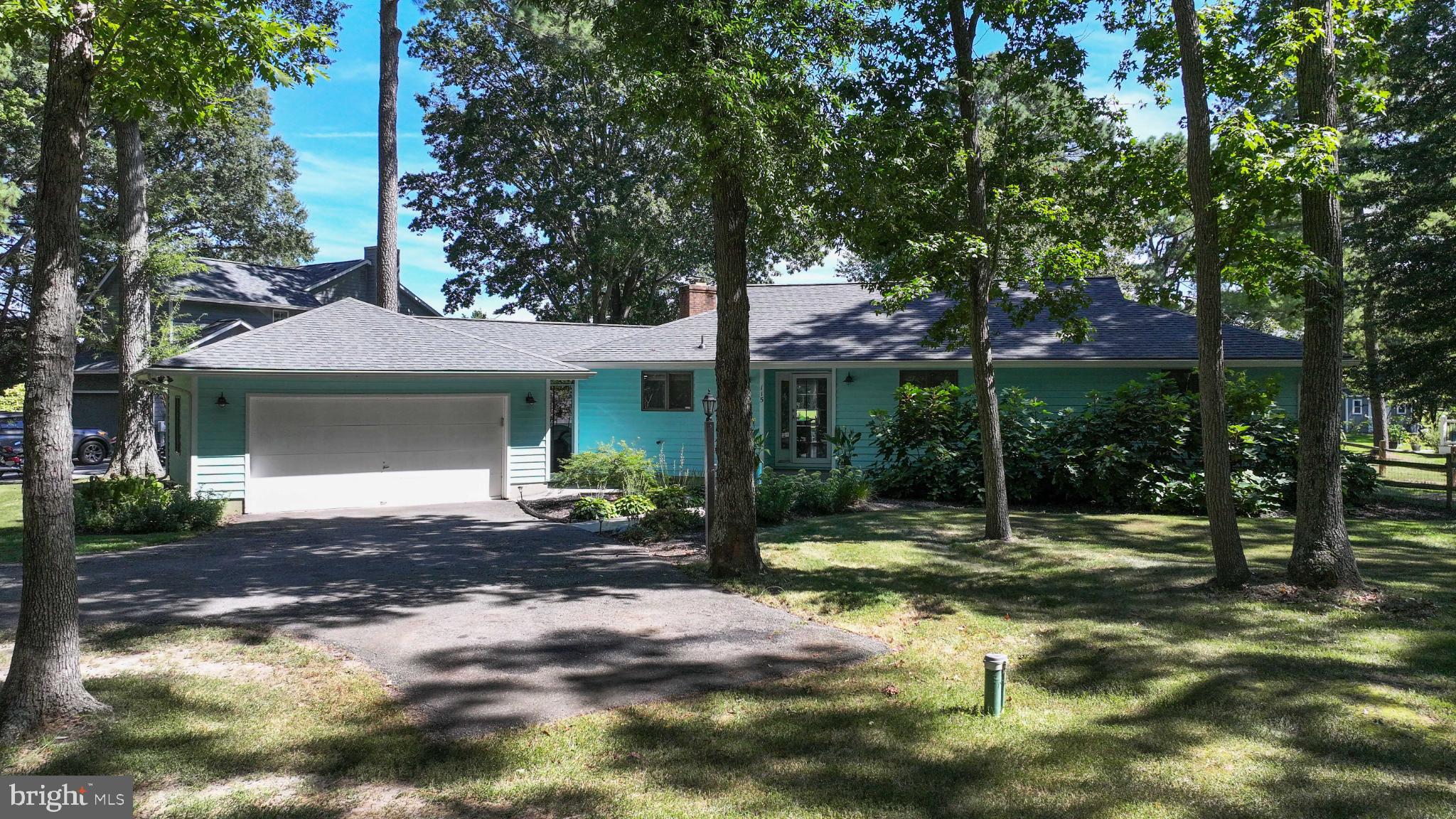 Beautiful setting on a 1/2 acre wooded lot.