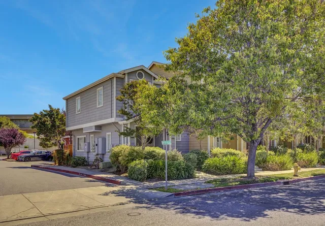 a view of a large building with a street