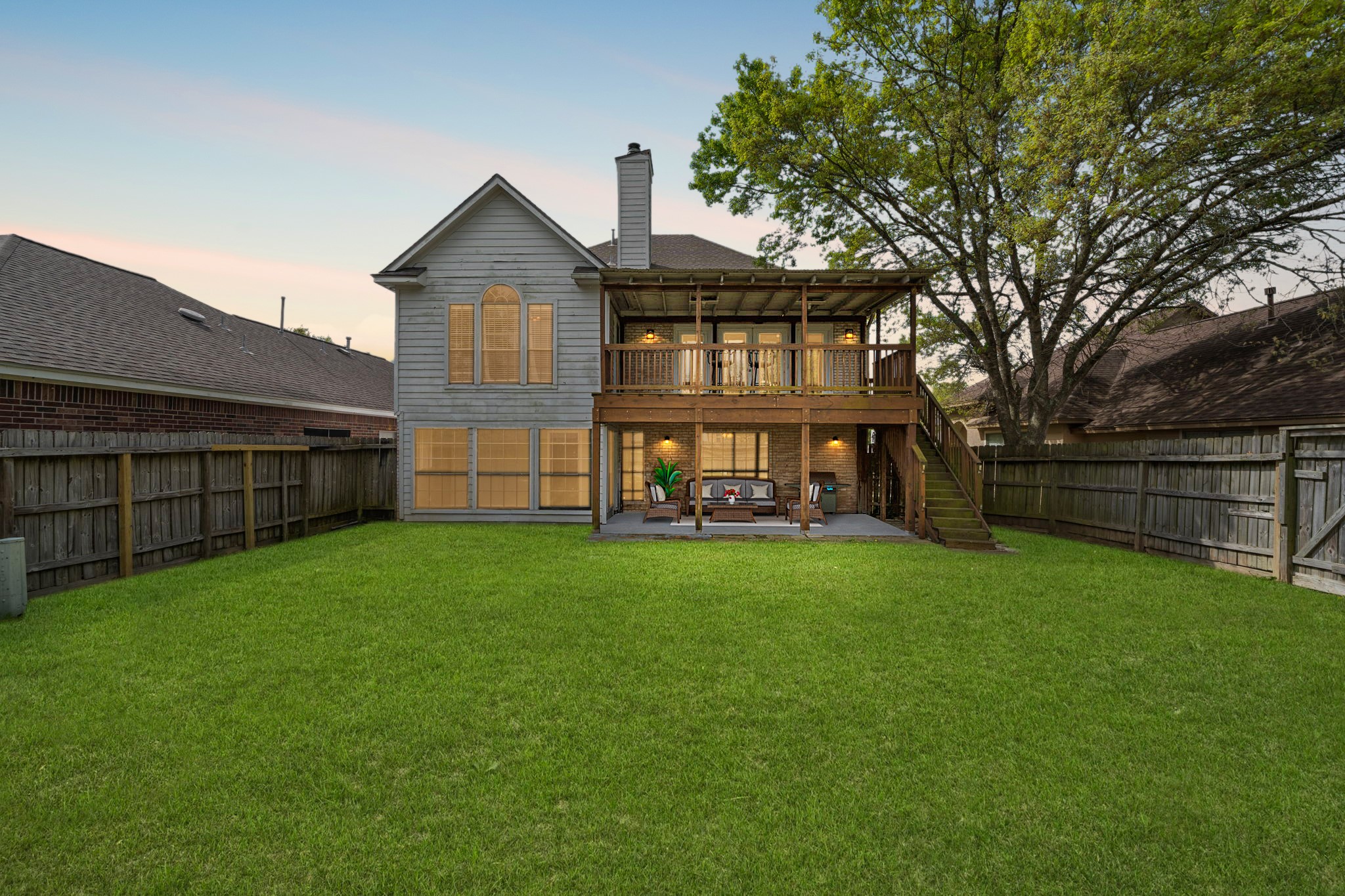 169 April Cove Montgomery, TX 77356 - Photo 29 of 39 Virtually Staged: Welcome to your new backyard! Check out all of that wonderful green space for the kids and pets to run around in, and a fantastic patio perfect for entertaining family, friends, and guests.