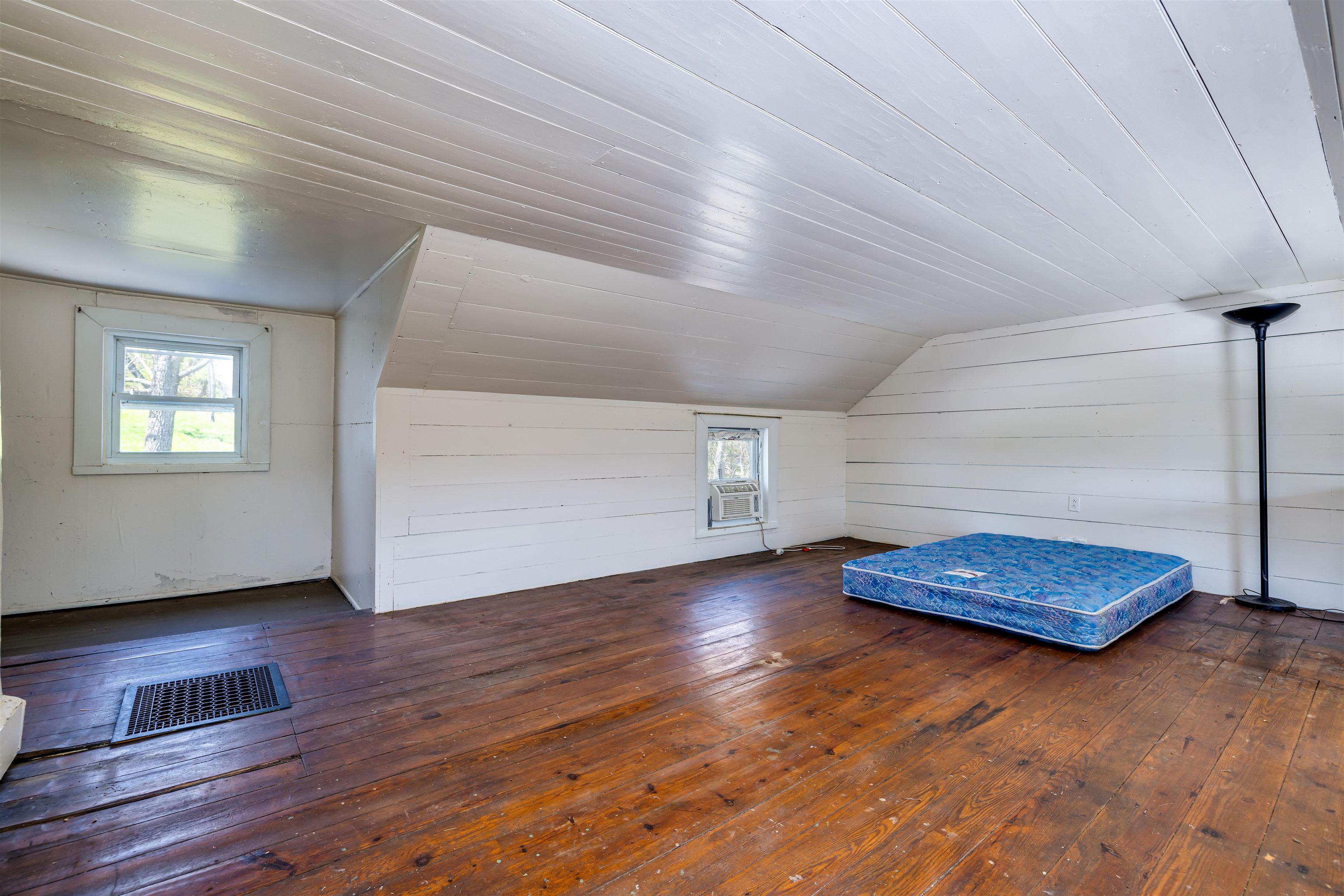 1476 Egypt Bend Road Luray, VA 22835 - Photo 27 of 74 a view of an empty room with window and wooden floor