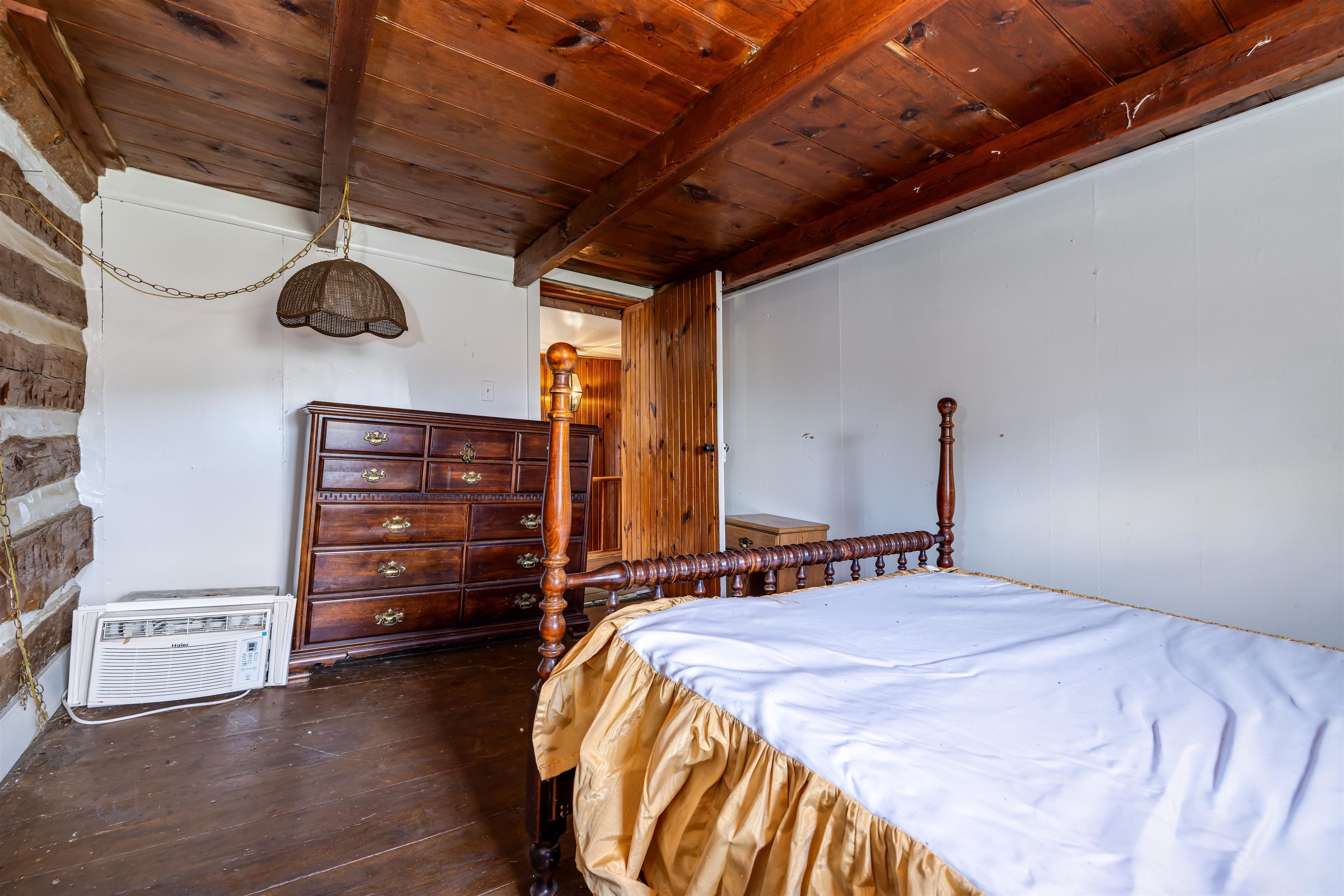 1476 Egypt Bend Road Luray, VA 22835 - Photo 30 of 74 a bedroom with a bed and a chandelier